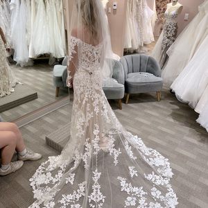 Allure Bridal wedding dress 9863.  Ivory lace, Never worn or altered.  Size 8.